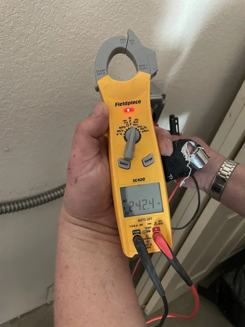 Voltage testing with clamp meter during Aluminum Wiring Replacement in Griffith